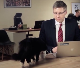 A Latvian mayor's cat interrupted his interview to try his tea.